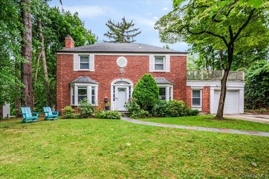 Welcome to this sunlit all brick center hall colonial located in - photo 2