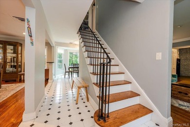 Welcome to this sunlit all brick center hall colonial located in - photo 3