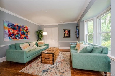 Welcome to this sunlit all brick center hall colonial located in - photo 4