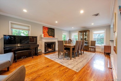 Welcome to this sunlit all brick center hall colonial located in - photo 6
