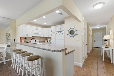 Experience living coastal at it's finest in this beautifully - photo 9