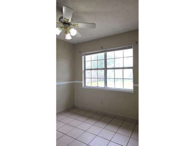 This 3-bedroom, 2-bath home with a garage and fenced backyard - photo 7