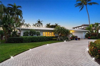 Framed by long, southwest-facing water views, this exceptional - photo 3