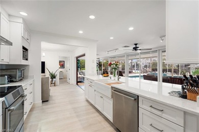 Framed by long, southwest-facing water views, this exceptional - photo 9
