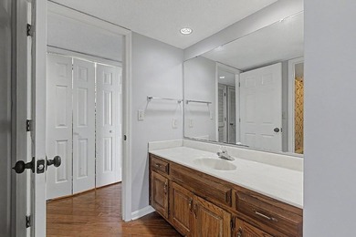 Welcome to this top-floor end-unit condo in Cypress Bay, located - photo 13