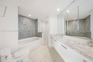 Enjoy breathtaking bay, river, and city views from this spacious