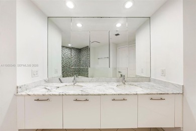 Enjoy breathtaking bay, river, and city views from this spacious