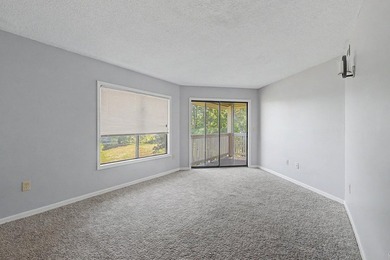 Welcome to this top-floor end-unit condo in Cypress Bay, located - photo 15