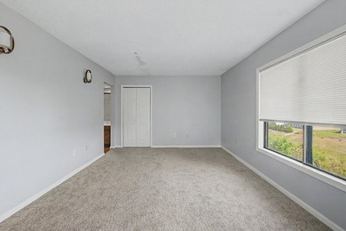 Welcome to this top-floor end-unit condo in Cypress Bay, located - photo 18