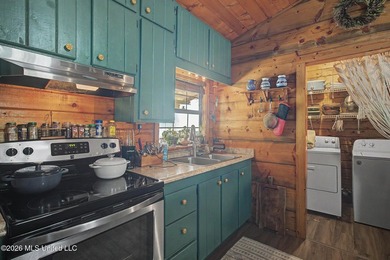 Tucked away among the rolling hills of South Mississippi, this - photo 18