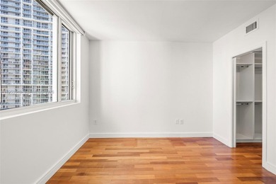 Enjoy breathtaking bay, river, and city views from this spacious