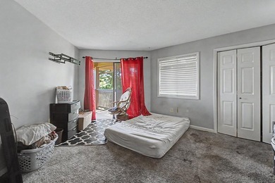Welcome to this top-floor end-unit condo in Cypress Bay, located - photo 21