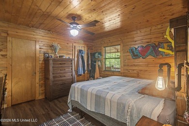 Tucked away among the rolling hills of South Mississippi, this - photo 21