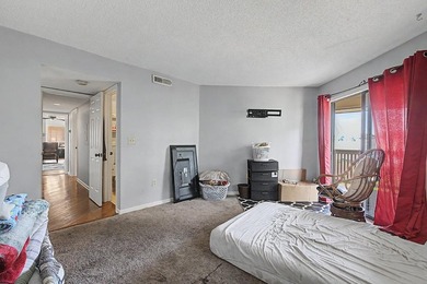 Welcome to this top-floor end-unit condo in Cypress Bay, located - photo 22