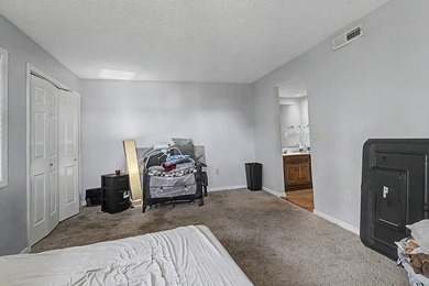 Welcome to this top-floor end-unit condo in Cypress Bay, located - photo 23