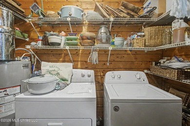 Tucked away among the rolling hills of South Mississippi, this - photo 25
