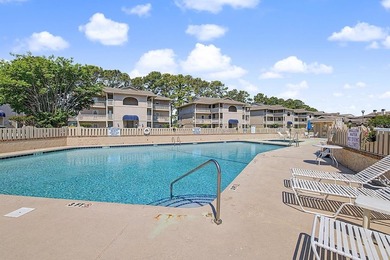 Welcome to this top-floor end-unit condo in Cypress Bay, located - photo 26
