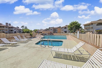 Welcome to this top-floor end-unit condo in Cypress Bay, located - photo 27