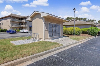 Welcome to this top-floor end-unit condo in Cypress Bay, located - photo 28