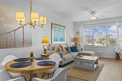 Beautiful 1-bedroom, 1-bath end unit located in the highly - photo 2