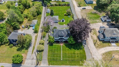 1928 Colonial in Riverhead - Tesla Solar Roof, 3-Car Heated - photo 8