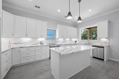 Beautiful new 3/2/2 home in secluded St. Andrews Place, nestled - photo 11