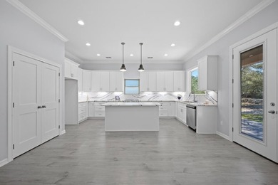 Beautiful new 3/2/2 home in secluded St. Andrews Place, nestled - photo 14