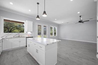 Beautiful new 3/2/2 home in secluded St. Andrews Place, nestled - photo 16