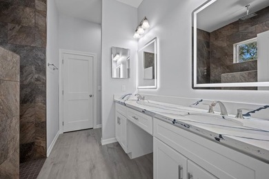 Beautiful new 3/2/2 home in secluded St. Andrews Place, nestled - photo 21
