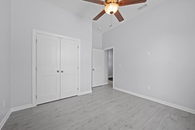 Beautiful new 3/2/2 home in secluded St. Andrews Place, nestled - photo 27