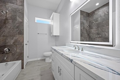 Beautiful new 3/2/2 home in secluded St. Andrews Place, nestled - photo 30