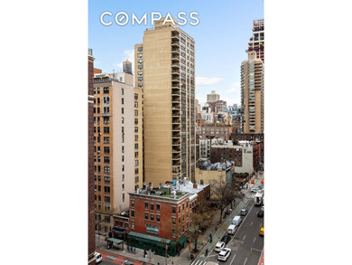 Open western city views highlight this bright corner one-bedroom - photo 11