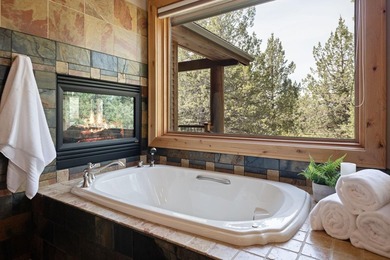 Located on the golf course, with mountain views, this NW lodge - photo 15