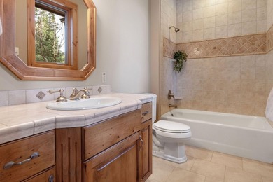 Located on the golf course, with mountain views, this NW lodge - photo 21