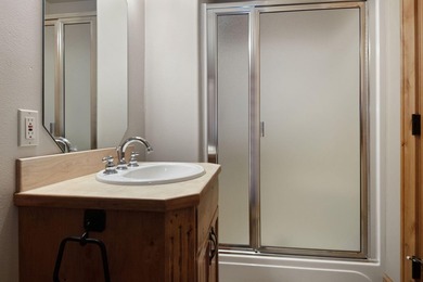 Located on the golf course, with mountain views, this NW lodge - photo 29