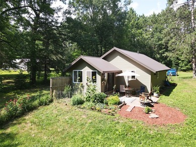 Enjoy peaceful riverfront living in this charming 1-bedroom - photo 1