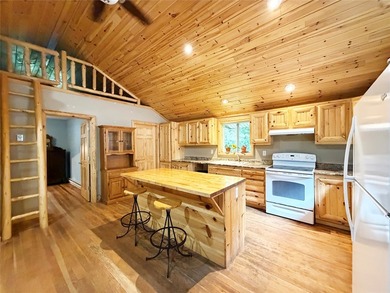 Enjoy peaceful riverfront living in this charming 1-bedroom - photo 5