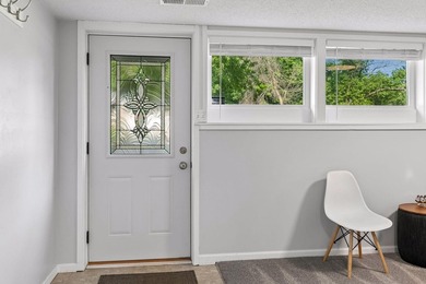 This walkout rambler is nestled on a quiet street with easy - photo 4