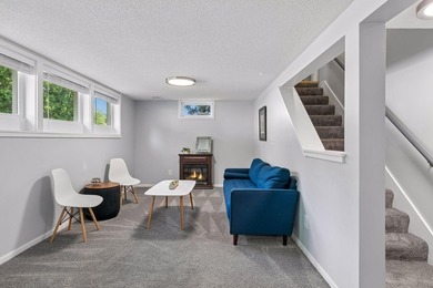 This walkout rambler is nestled on a quiet street with easy - photo 5