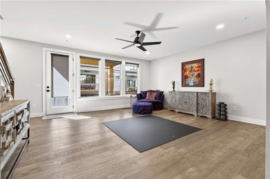 Just one year old and like new, this luxury townhome is located