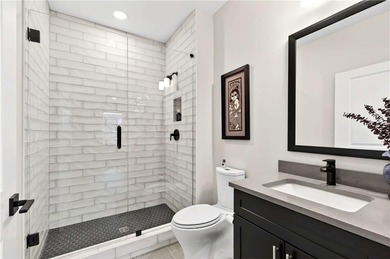 Just one year old and like new, this luxury townhome is located