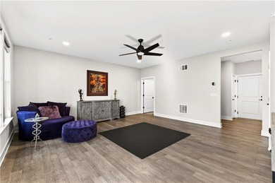 Just one year old and like new, this luxury townhome is located