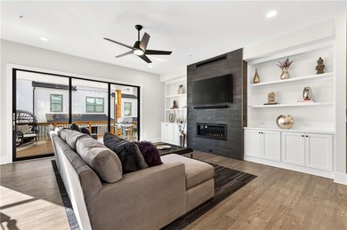 Just one year old and like new, this luxury townhome is located