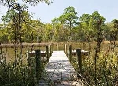 Build your dream home on this canal front lot with Bay access - photo 7