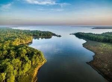 Build your dream home on this canal front lot with Bay access - photo 9