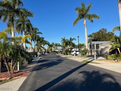 This north facing concrete lot with added pavers on the side - photo 2
