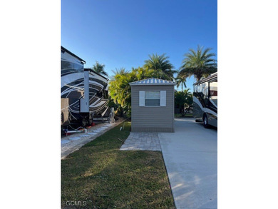 This north facing concrete lot with added pavers on the side - photo 4