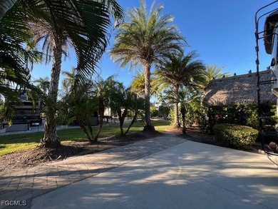 This north facing concrete lot with added pavers on the side - photo 8
