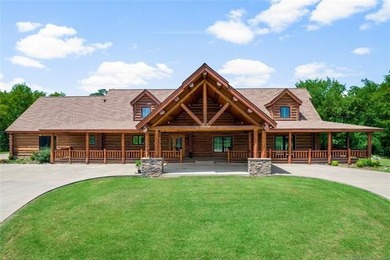 This meticulous, custom log home is high quality in design - photo 2