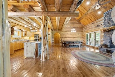 This meticulous, custom log home is high quality in design - photo 6
